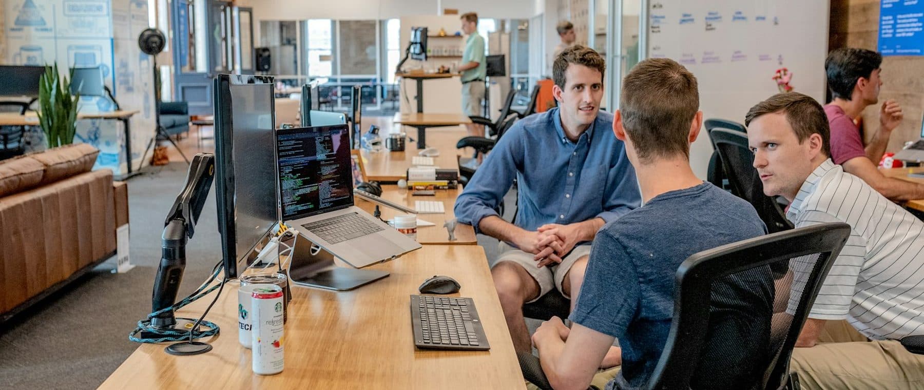 A small team working together around a table